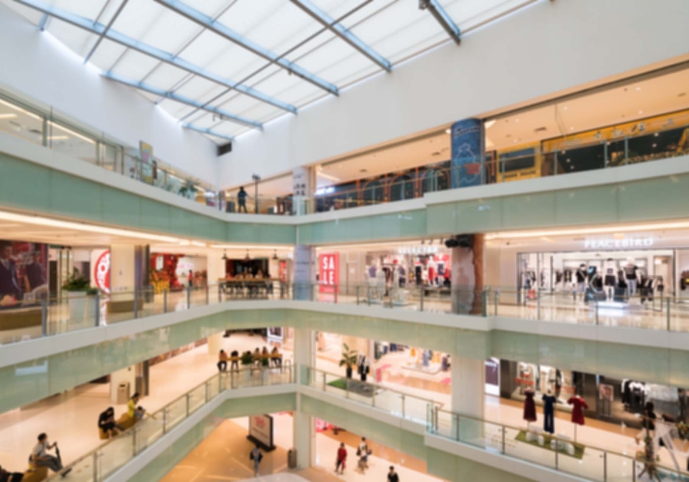 Abstract blur and defocused shopping mall in department store interior for background Abstract blur and defocused shopping mall in department store interior for background