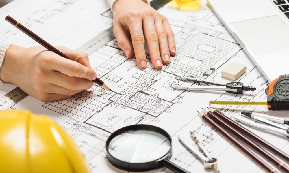 architect-drawing-plan-with-pencil architect-drawing-plan-with-pencil